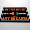 In This House We Praise Jesus And Say Go Canes Doormat